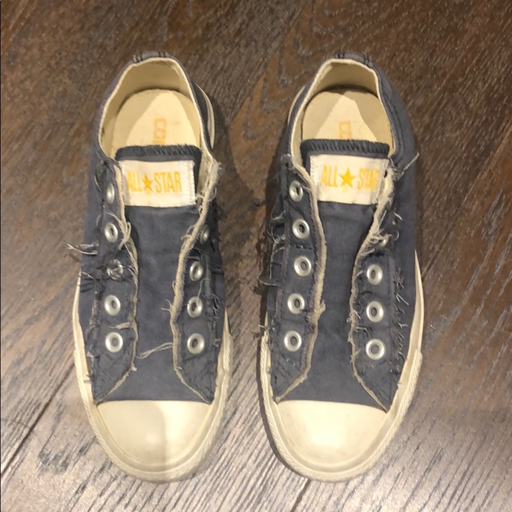 Converse slip on frayed sneakers